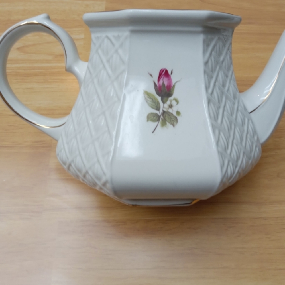 White and Pink Teapot with Textured Pattern